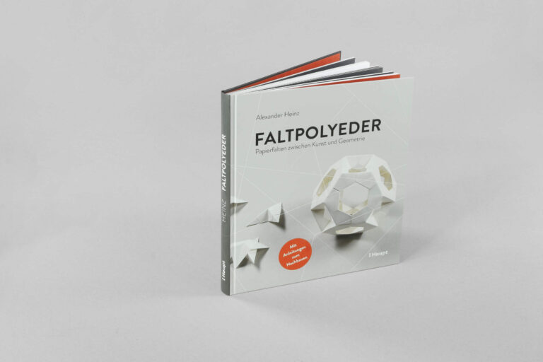 Buchcover von „Faltpolyeder“ mit farbigem Origami-Design auf weißem Hintergrund.